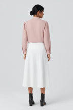A modern long-sleeved shirt with a stand-up collar – an elegant, casual, and everyday blouse
