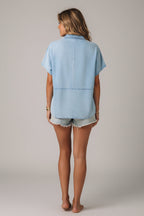 Luźny top damski z jeansu – z rozcięciem przy szyi i w stylu oversize
