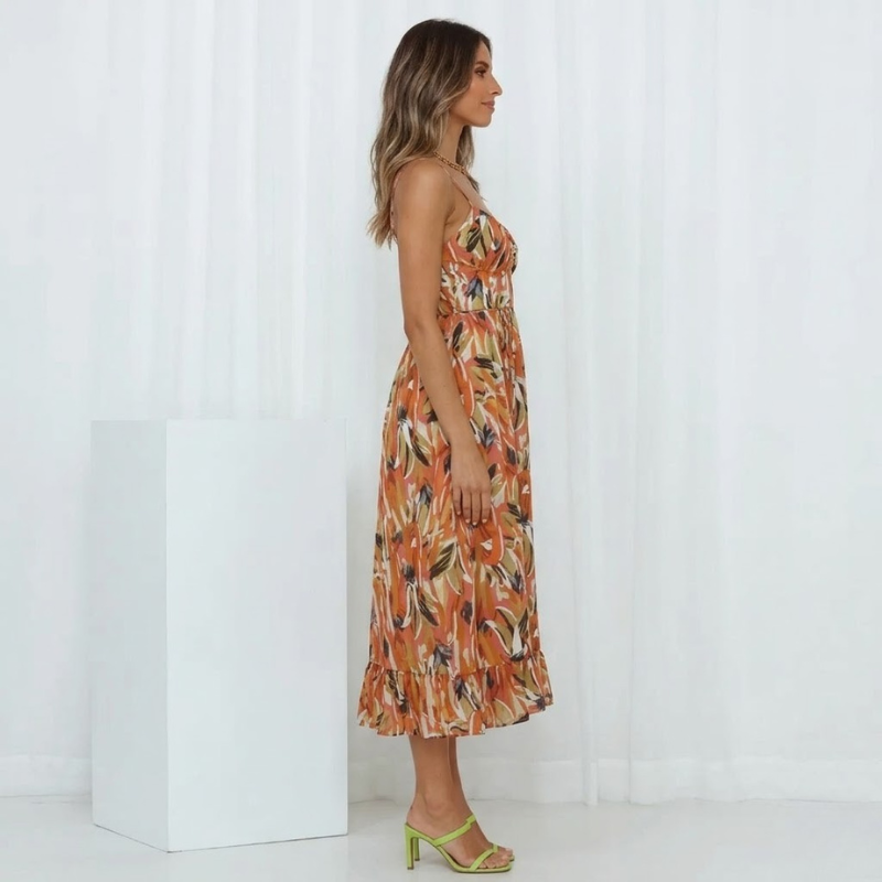 Promienna, kobieca sukienka midi – zwiewny, elegancki styl na lato dla kobiet