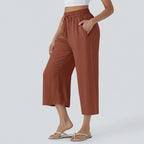 High-waisted trousers with an elasticated waist – wide leg, linen, casual