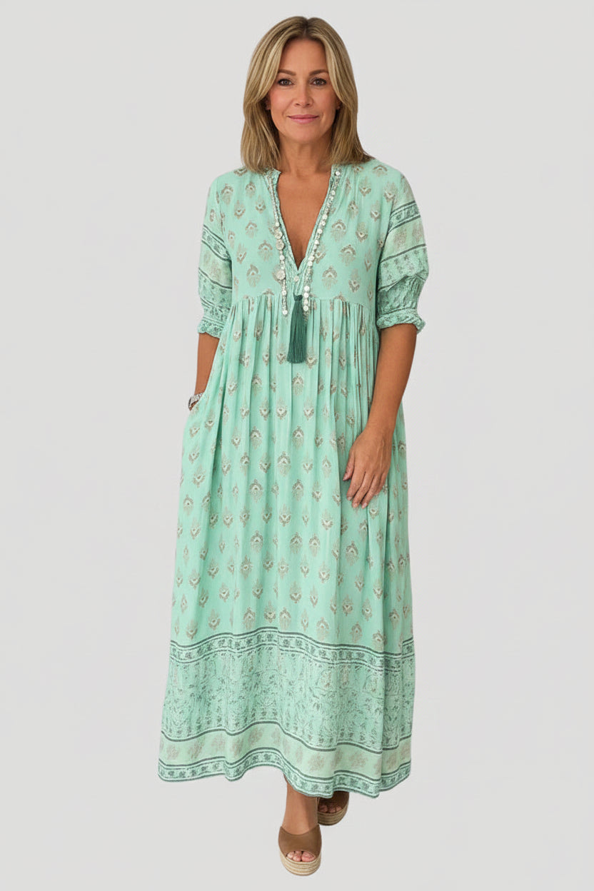 Sukienka midi w stylu boho z luźnym wzorem – letni, plażowy styl z wygodnymi kieszeniami bocznymi