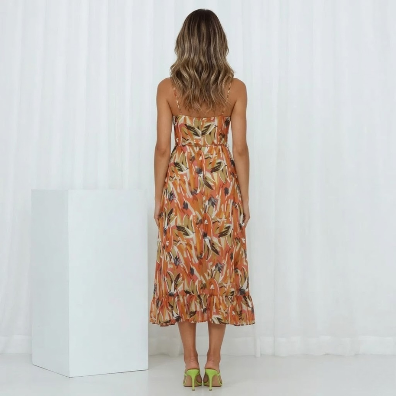 Promienna, kobieca sukienka midi – zwiewny, elegancki styl na lato dla kobiet