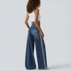 High-waisted jeans with striped distressing – flowy, wide legs and a loose fit