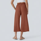 High-waisted trousers with an elasticated waist – wide leg, linen, casual