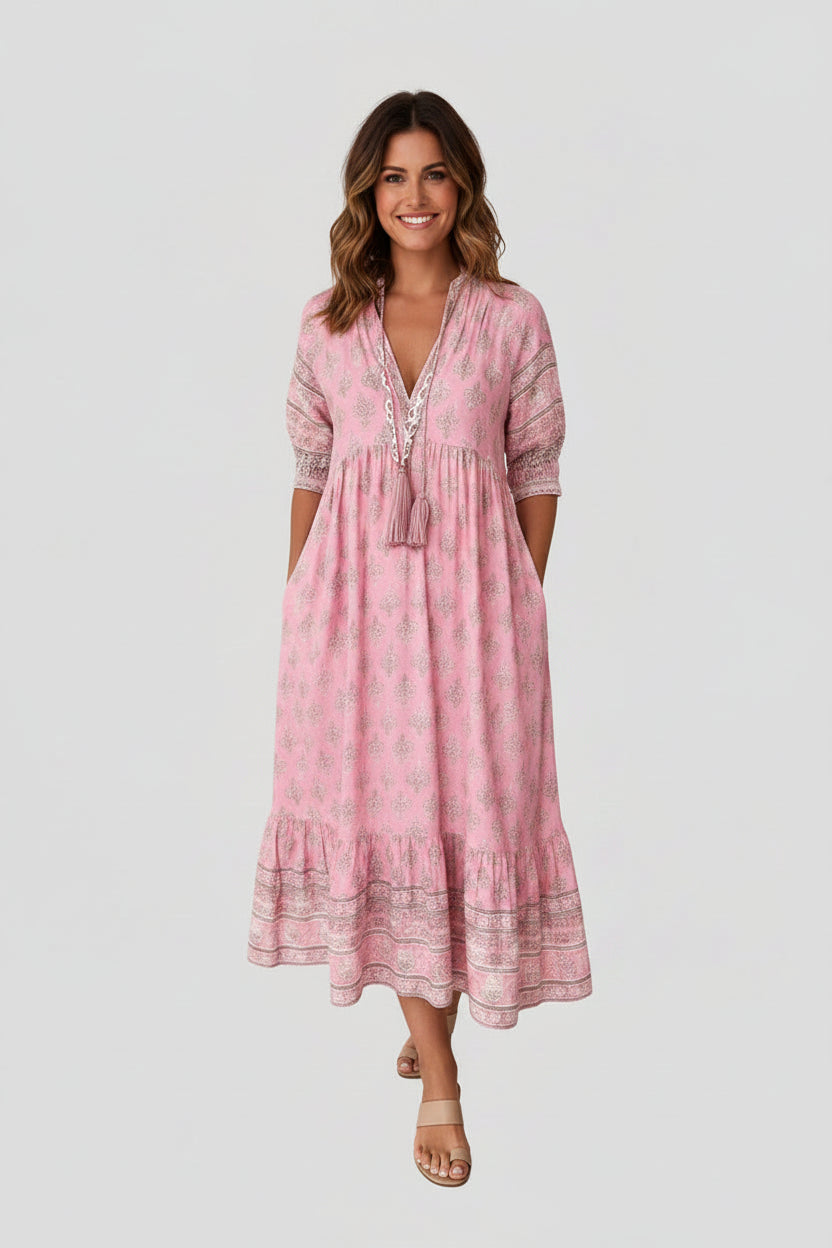 Sukienka midi w stylu boho z luźnym wzorem – letni, plażowy styl z wygodnymi kieszeniami bocznymi