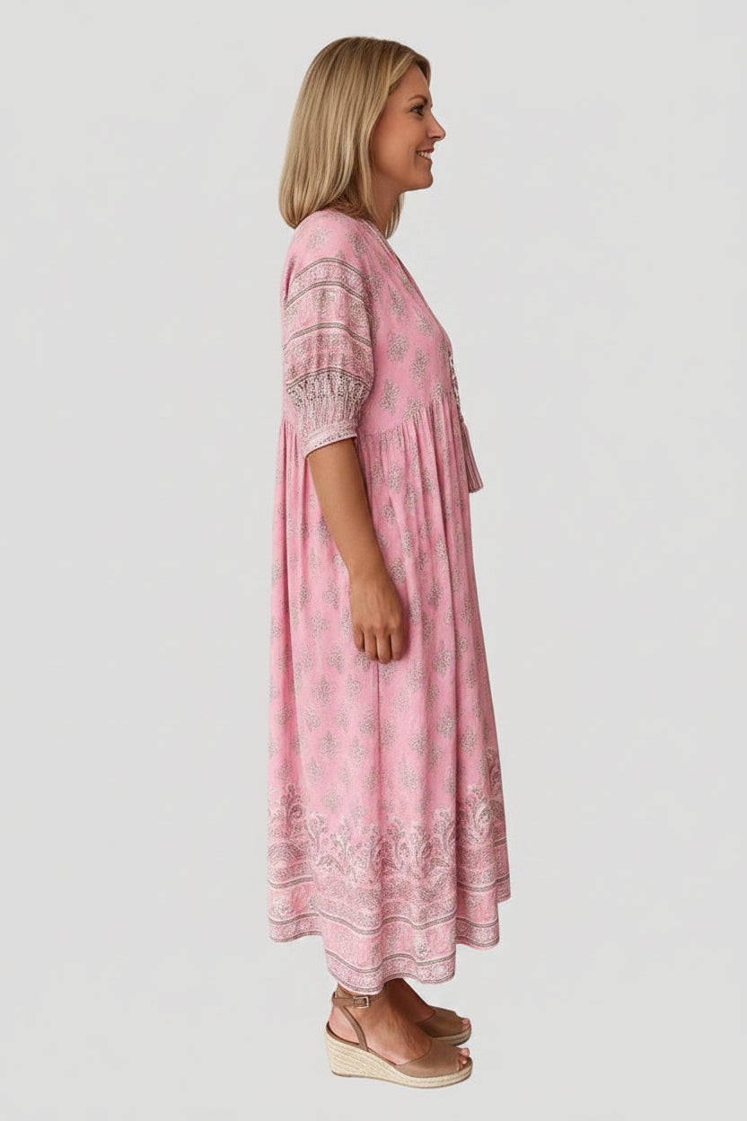 Sukienka midi w stylu boho z luźnym wzorem – letni, plażowy styl z wygodnymi kieszeniami bocznymi