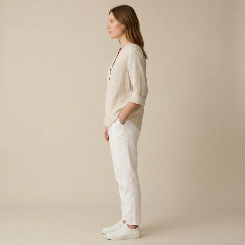 Elegant women's blouse with a V-neck and buttons - loose fit with roll-up sleeves