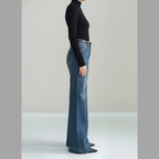 Elegant flared jeans with a mid-rise and a slit - classic bootcut style for women
