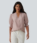 Stylish blouse with puffed sleeves and a V-neck – a loose fit, a feminine everyday blouse