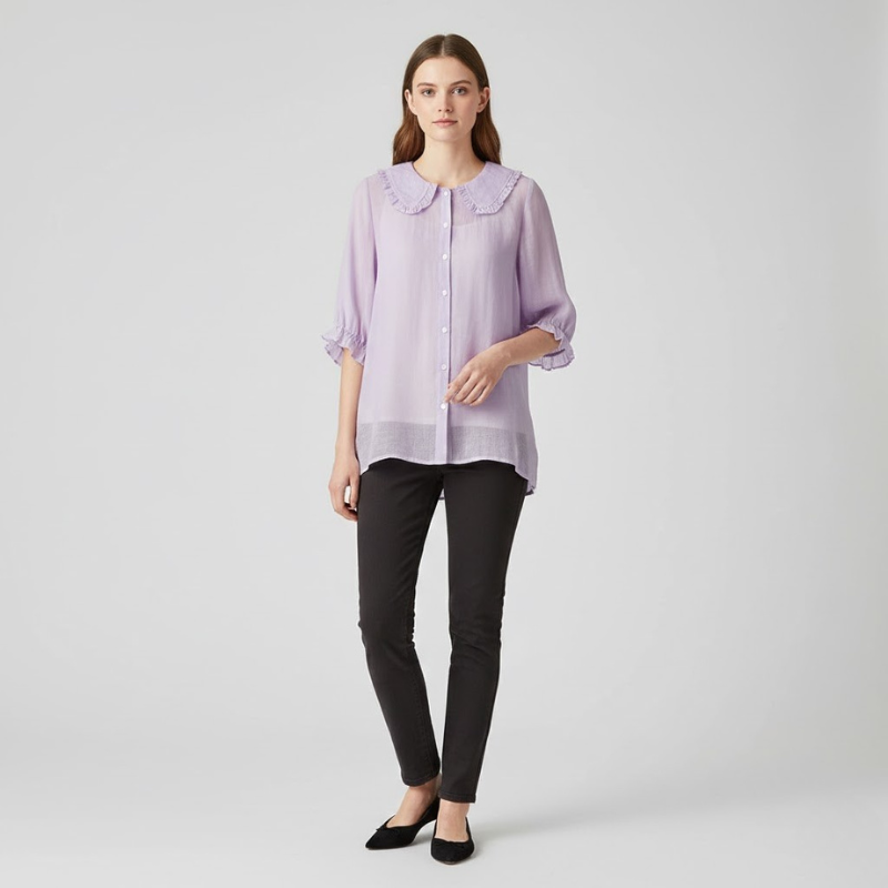 Nowoczesna, elegancka bluzka z falbankami – uniwersalny element kobiecej mody
