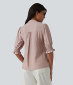 Stylish blouse with puffed sleeves and a V-neck – a loose fit, a feminine everyday blouse