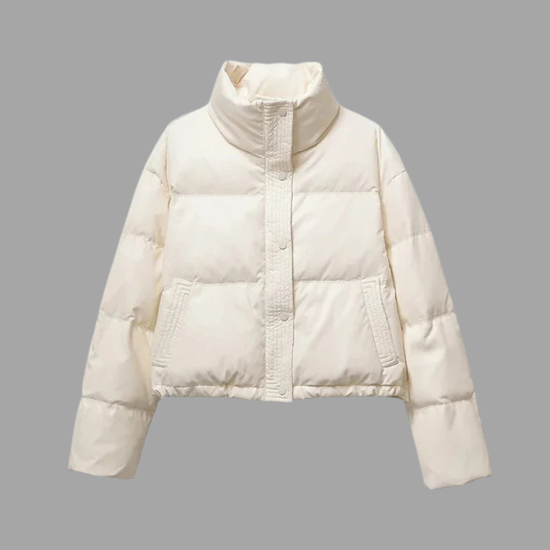 Kurtka puchowa damska o skróconej długości – przytulna, z wysokim kołnierzem, niezbędny element zimy