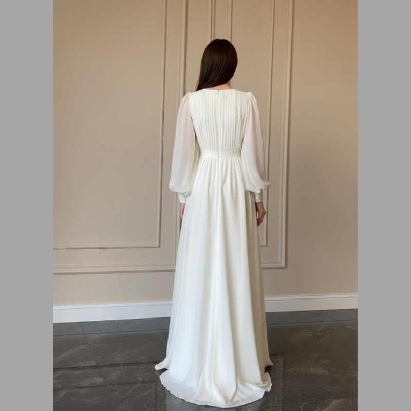 Długa sukienka damska z bufiastymi rękawami – elegancka kreacja na wesele i oficjalne wyjście