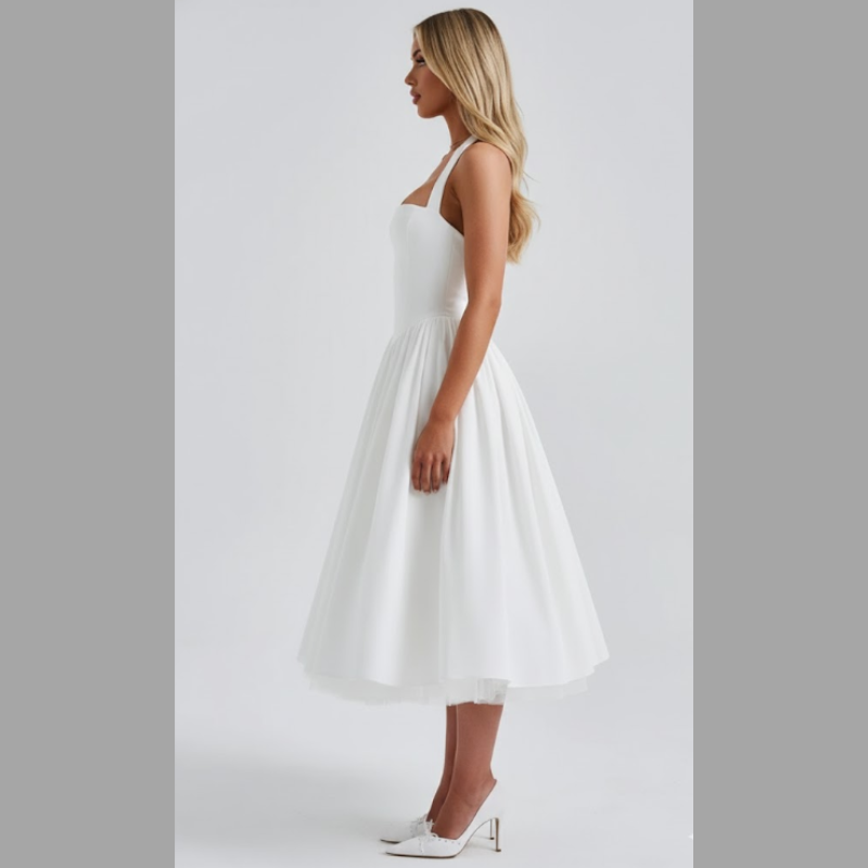 Ponadczasowa damska sukienka midi z wiązaniem na szyi – elegancki strój na wesele