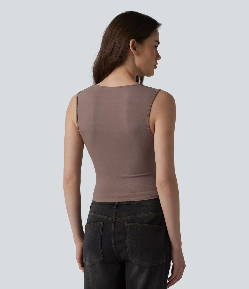 Fitted ribbed knit top with criss-cross sleeves – stylish V-neckline with ruching at the waist