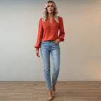 Women's long-sleeve V-neck blouse – polka dot pattern with ruffle cuffs