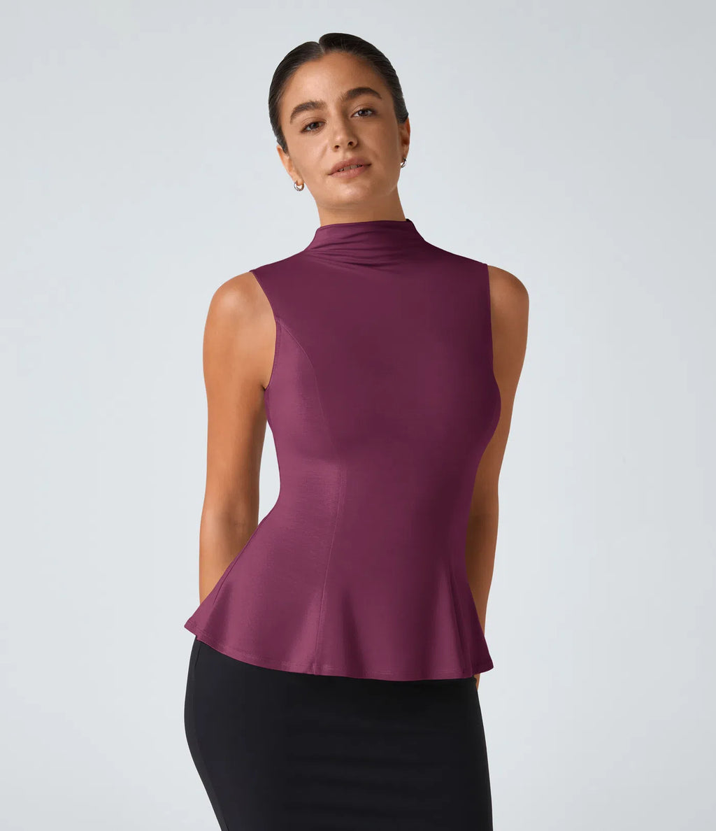 Elegancki top z wysokim kołnierzem i baskinką – stylowy, strukturalny top do biura