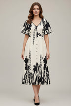 Women's midi dress with botanical print - elegant summer style with a V-neck