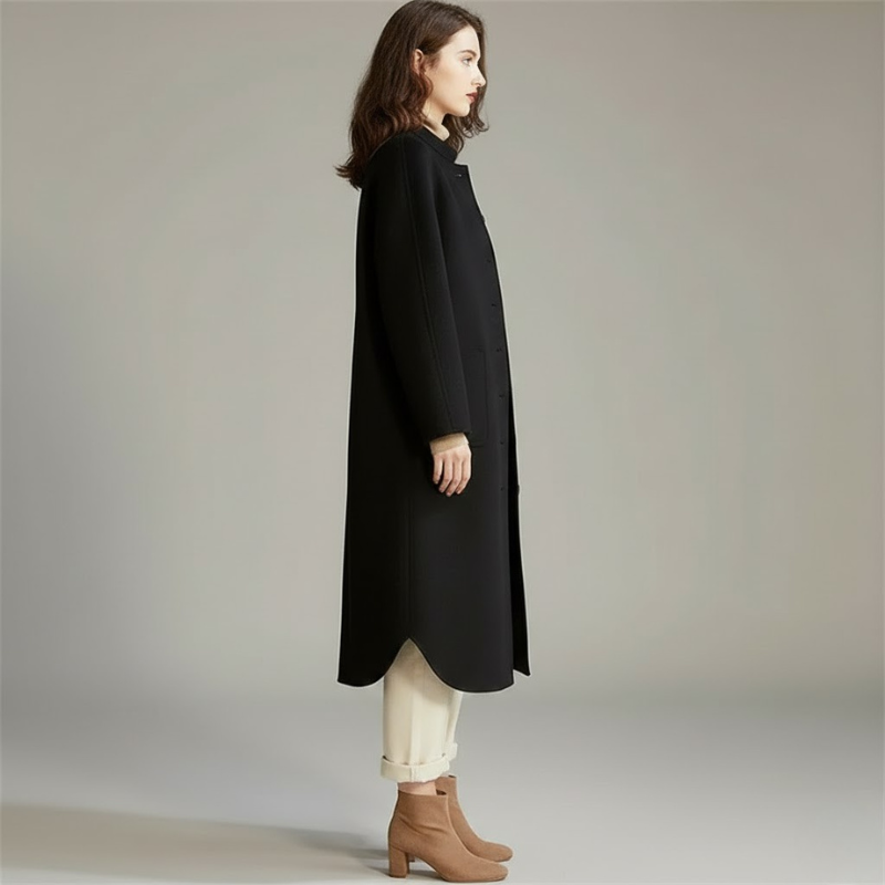 Nowoczesny damski długi płaszcz – elegancki element zimowej garderoby warstwowej