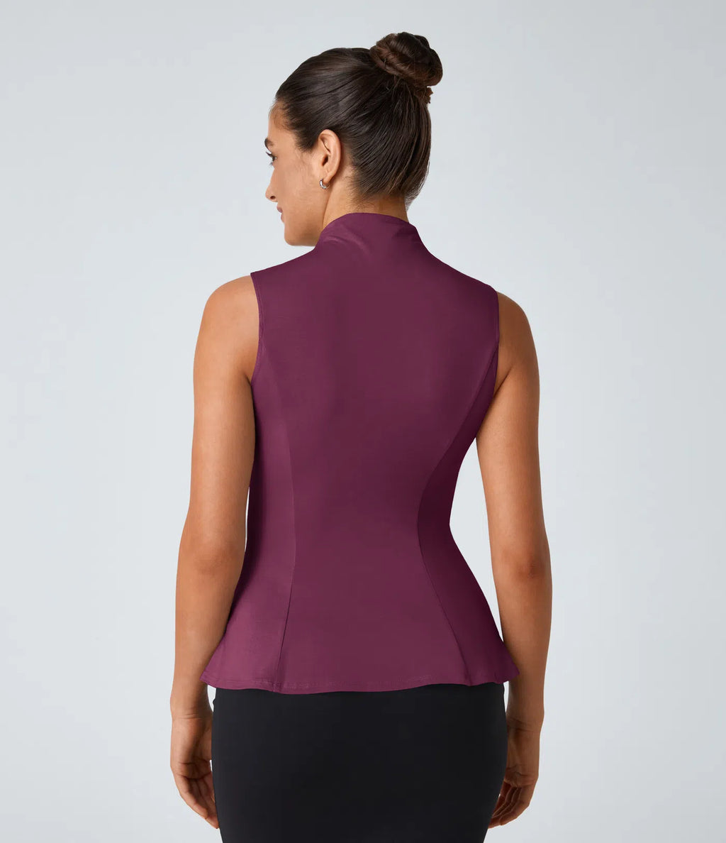 Elegant top with a high collar and peplum - a stylish, structured top for the office