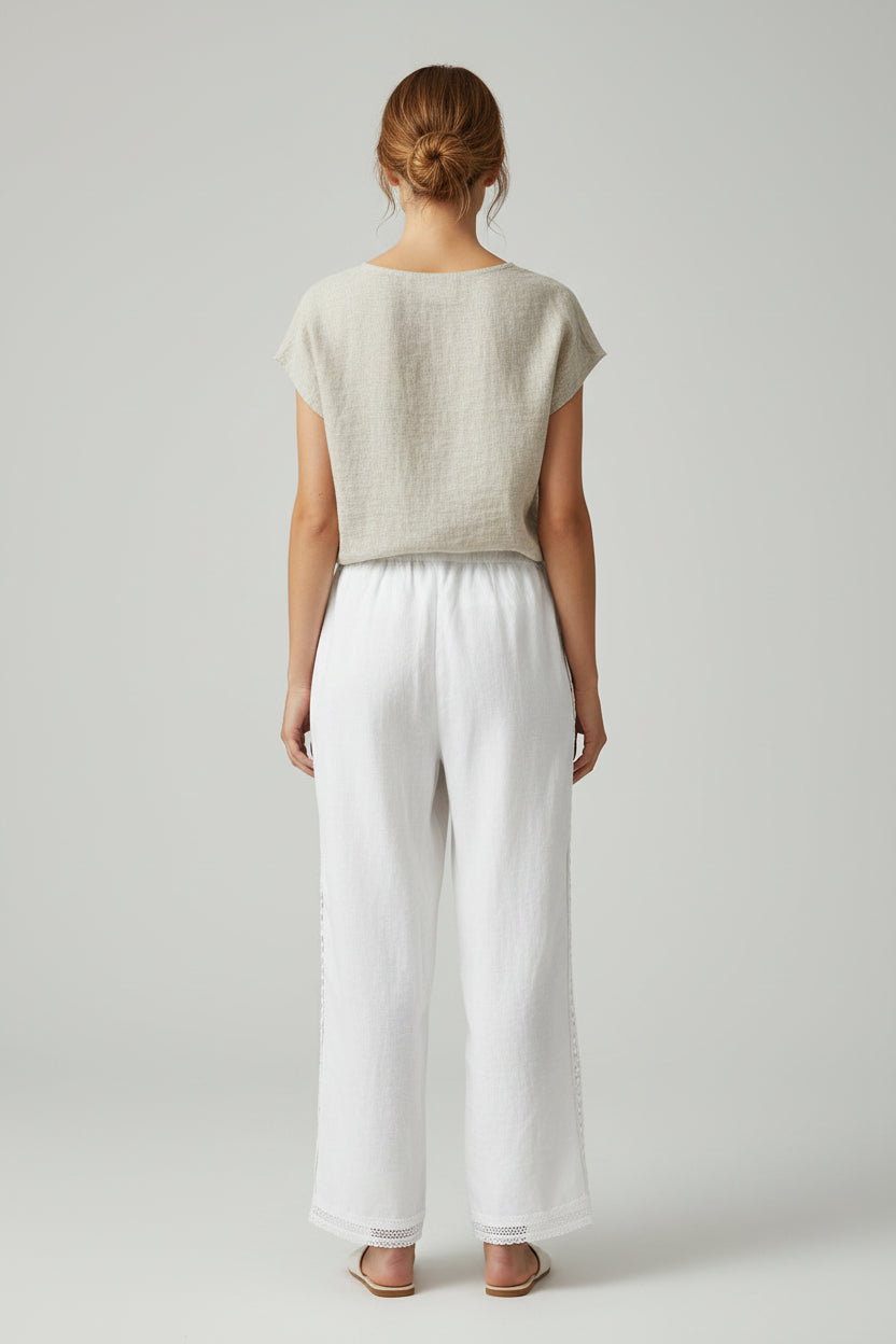 Damskie spodnie z koronką i wąskimi nogawkami – szykowne spodnie patchworkowe