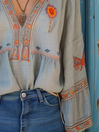 Women's boho blouse with embroidered V-neck – artisan-inspired, timeless, effortlessly elegant