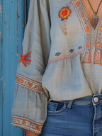 Women's boho blouse with embroidered V-neck – artisan-inspired, timeless, effortlessly elegant