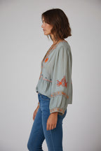 Women's boho blouse with embroidered V-neck – artisan-inspired, timeless, effortlessly elegant