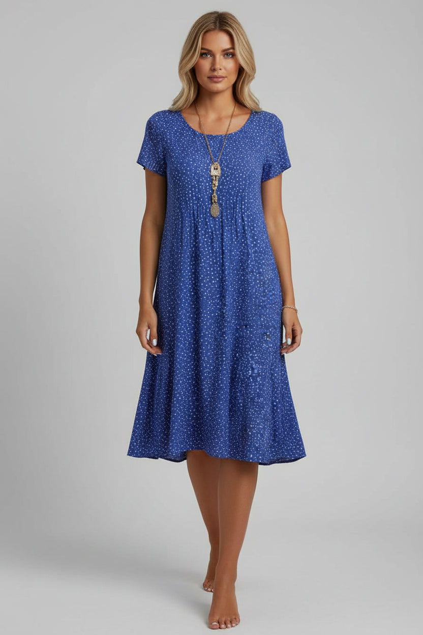 Kwiatowa sukienka midi w stylu boho – swobodna, letnia elegancja