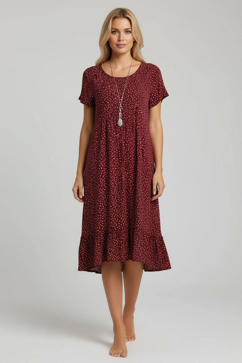 Kwiatowa sukienka midi w stylu boho – swobodna, letnia elegancja