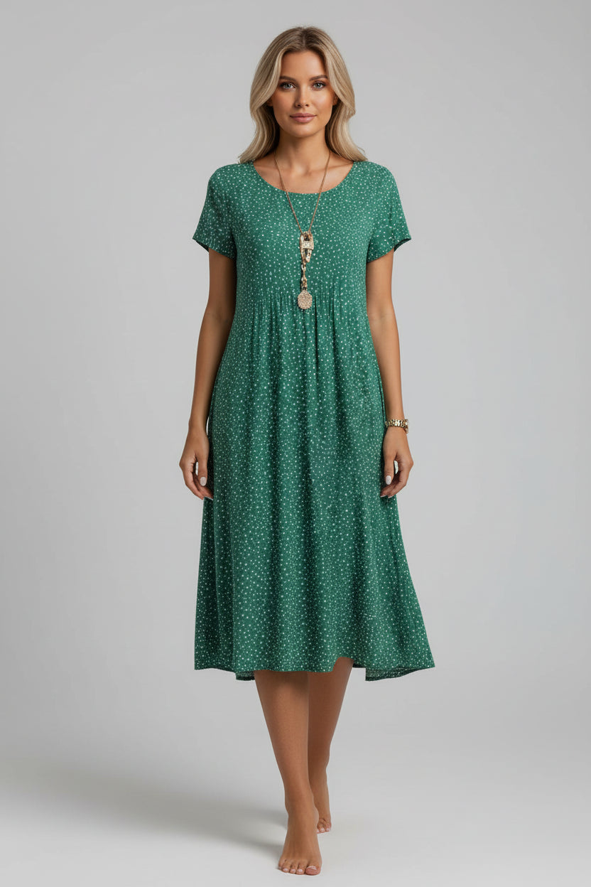 Kwiatowa sukienka midi w stylu boho – swobodna, letnia elegancja